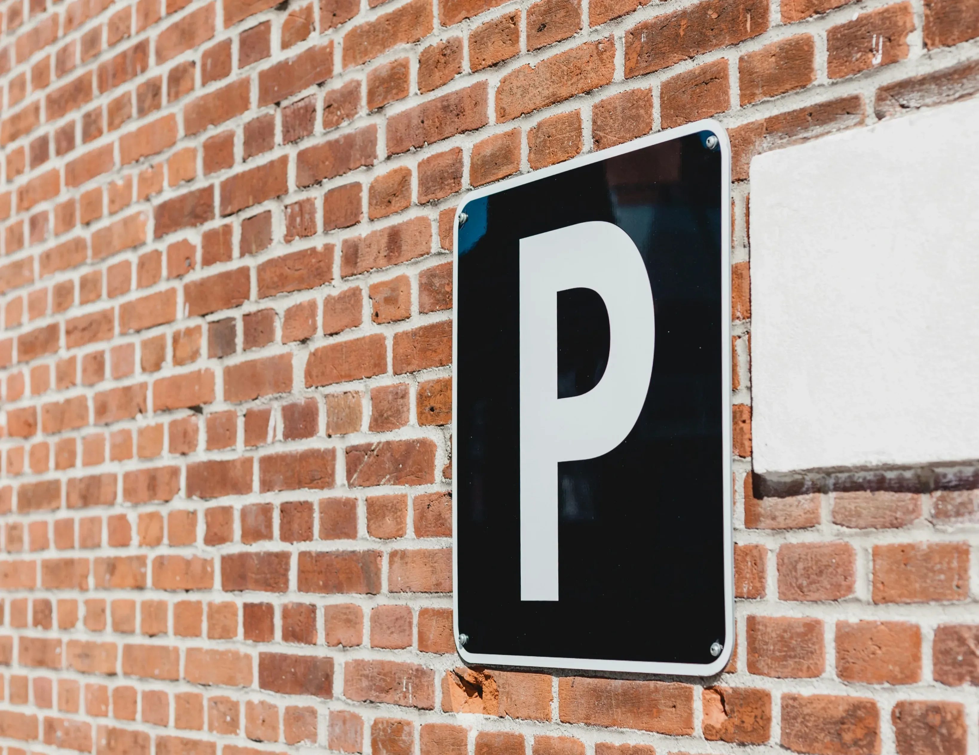 Panneau signalant une place de parking.